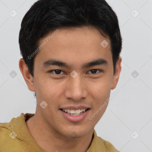 Joyful latino young-adult male with short  brown hair and brown eyes