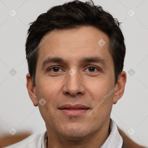 Joyful white adult male with short  brown hair and brown eyes