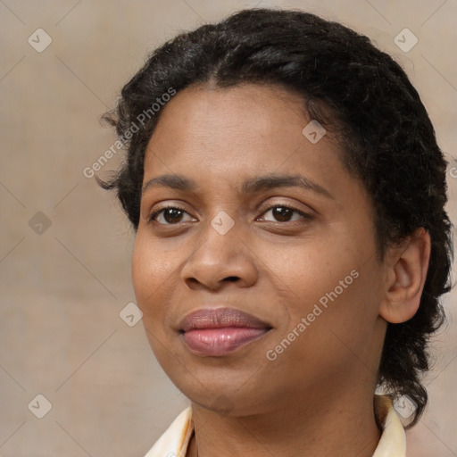 Joyful black young-adult female with medium  brown hair and brown eyes