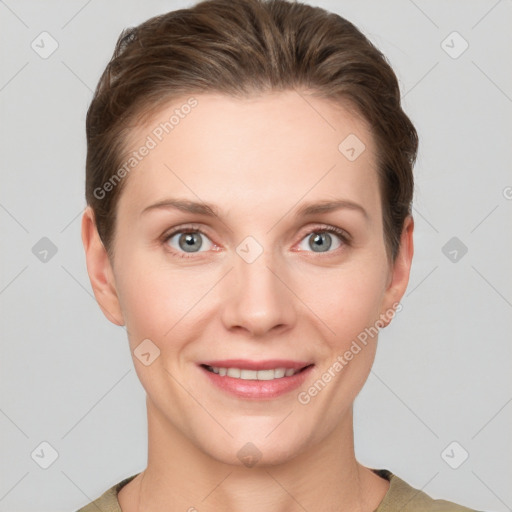 Joyful white young-adult female with short  brown hair and grey eyes