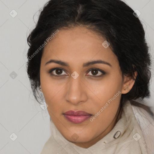 Joyful latino young-adult female with long  brown hair and brown eyes