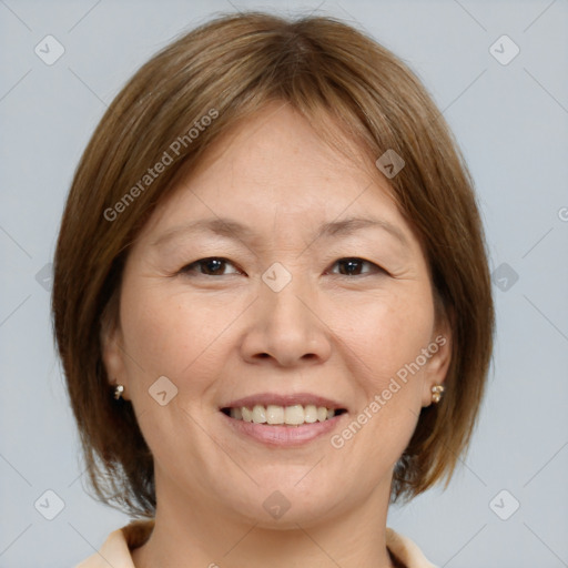 Joyful white adult female with medium  brown hair and brown eyes