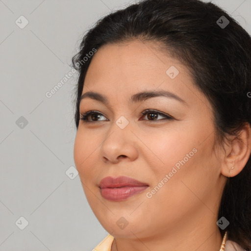 Joyful white young-adult female with long  brown hair and brown eyes