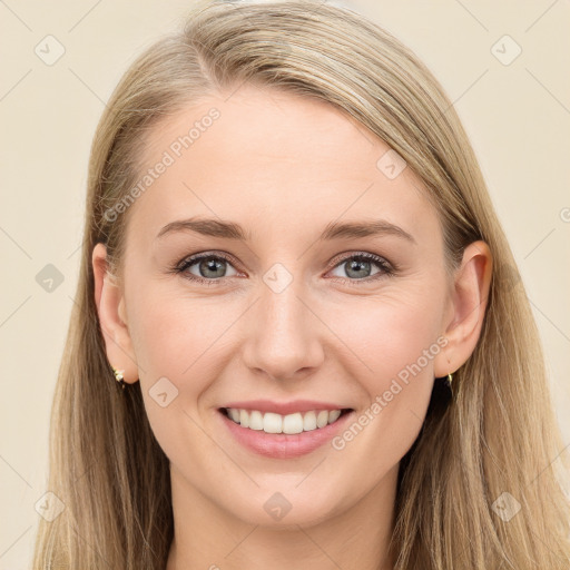 Joyful white young-adult female with long  brown hair and blue eyes