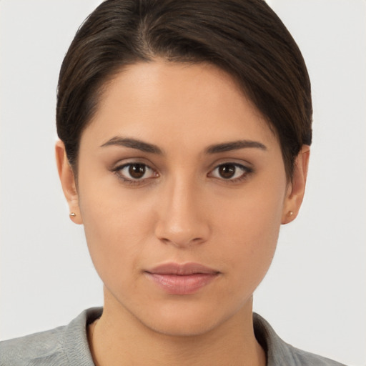 Neutral white young-adult female with short  brown hair and brown eyes