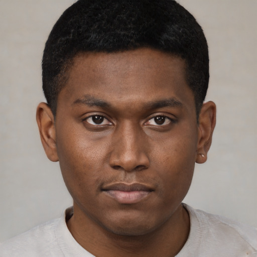 Neutral black young-adult male with short  brown hair and brown eyes