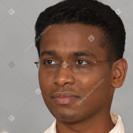 Neutral black young-adult male with short  black hair and brown eyes