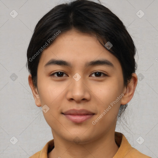 Joyful asian young-adult female with short  brown hair and brown eyes