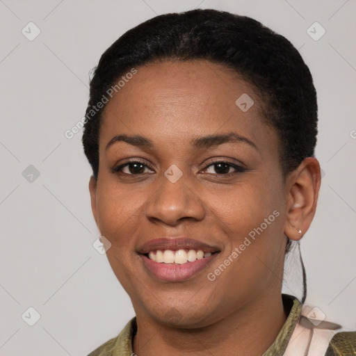 Joyful latino young-adult female with short  black hair and brown eyes