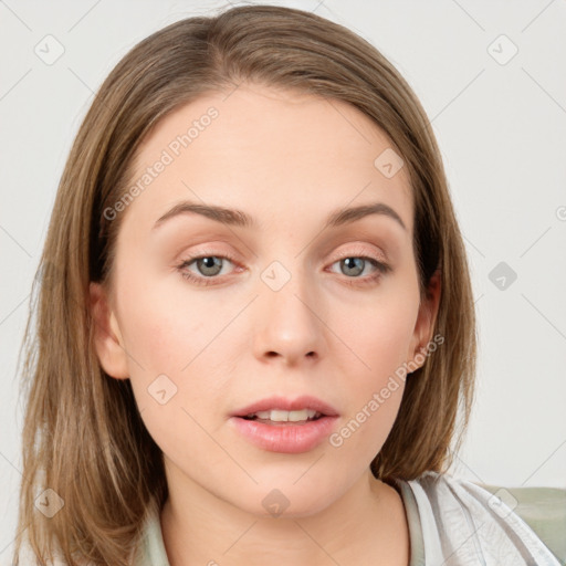 Neutral white young-adult female with medium  brown hair and grey eyes