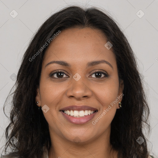 Joyful latino young-adult female with long  brown hair and brown eyes