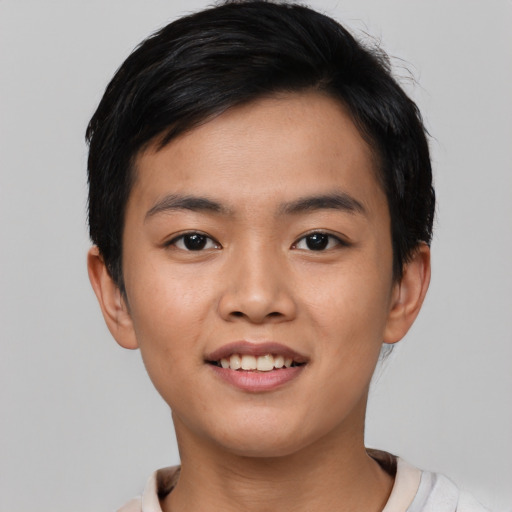 Joyful asian young-adult male with short  black hair and brown eyes