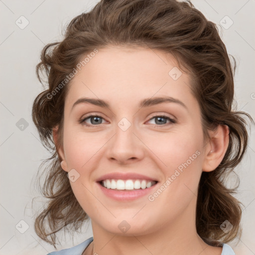 Joyful white young-adult female with medium  brown hair and green eyes