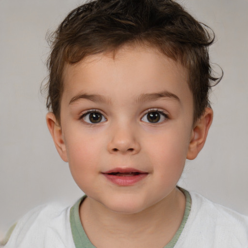 Joyful white child male with short  brown hair and brown eyes