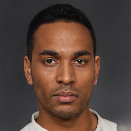 Neutral black young-adult male with short  black hair and brown eyes