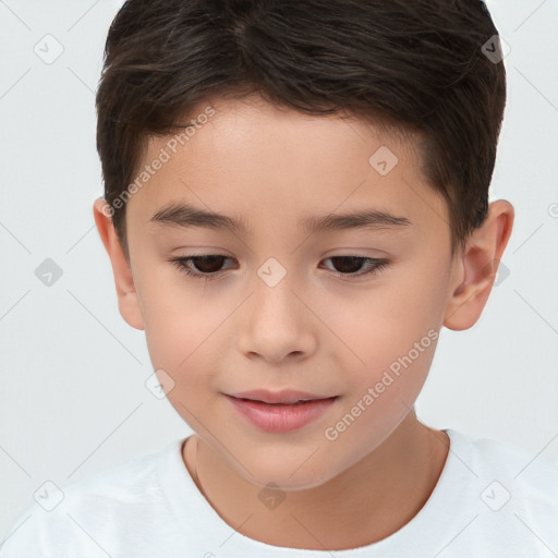 Joyful white child male with short  brown hair and brown eyes