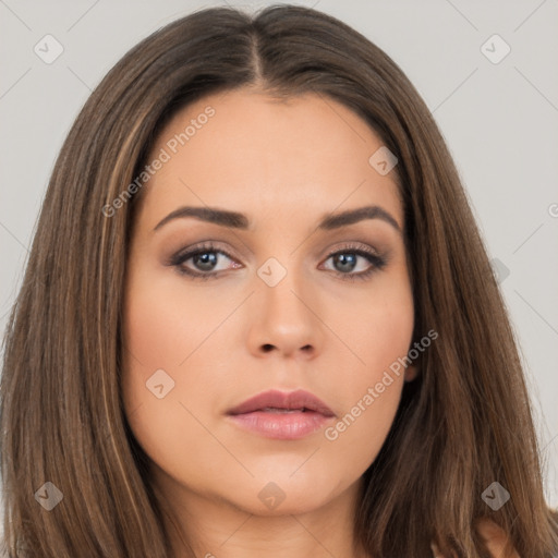 Neutral white young-adult female with long  brown hair and brown eyes