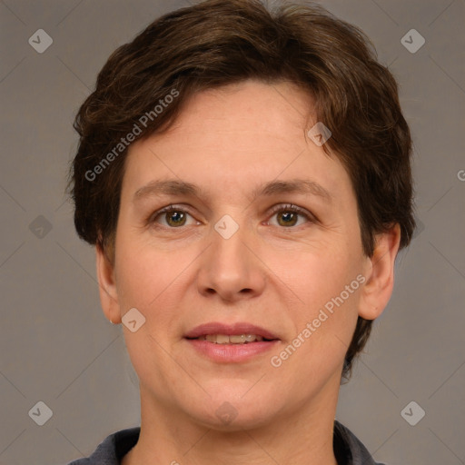 Joyful white adult female with short  brown hair and brown eyes