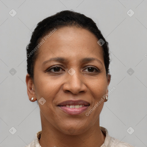 Joyful latino young-adult female with short  brown hair and brown eyes