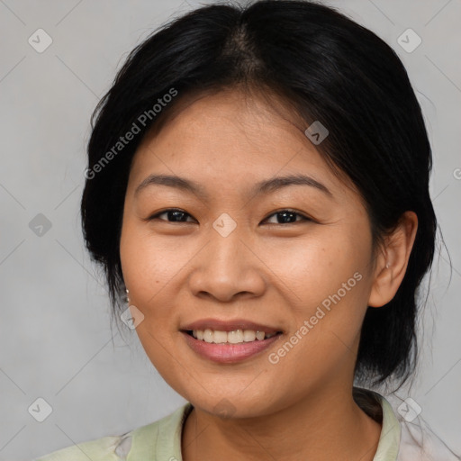 Joyful asian young-adult female with medium  brown hair and brown eyes