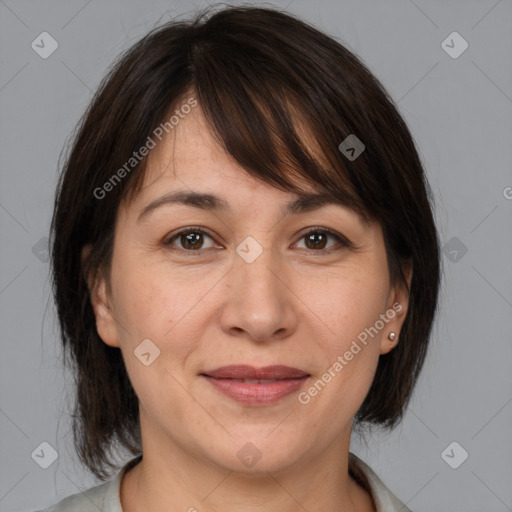 Joyful white adult female with medium  brown hair and brown eyes