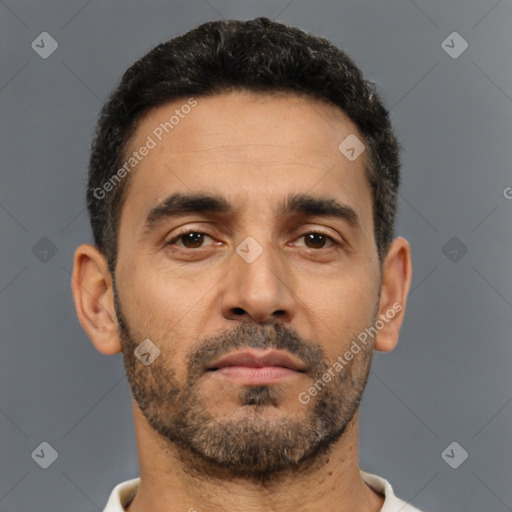 Neutral latino young-adult male with short  black hair and brown eyes