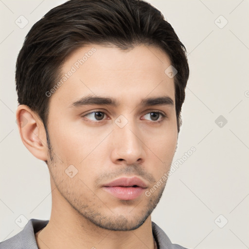 Neutral white young-adult male with short  brown hair and brown eyes