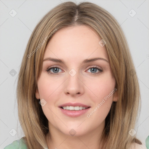 Joyful white young-adult female with medium  brown hair and green eyes