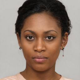 Neutral black young-adult female with short  brown hair and brown eyes