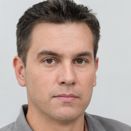 Neutral white adult male with short  brown hair and brown eyes