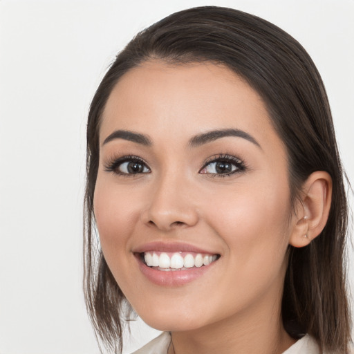 Joyful white young-adult female with medium  black hair and brown eyes