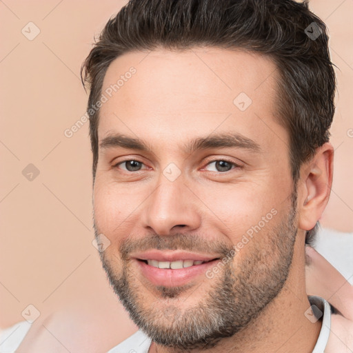 Joyful white young-adult male with short  brown hair and brown eyes