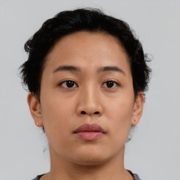 Neutral asian young-adult female with short  brown hair and brown eyes