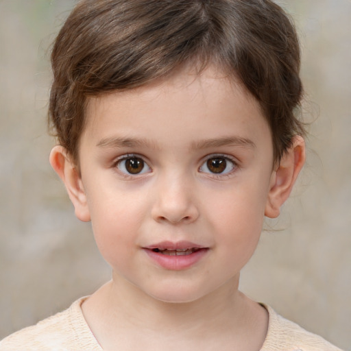 Joyful white child male with short  brown hair and brown eyes