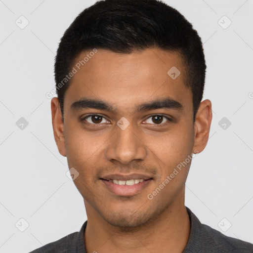 Joyful latino young-adult male with short  black hair and brown eyes