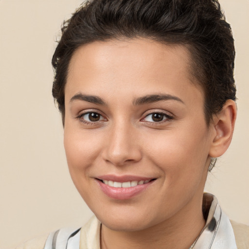 Joyful white young-adult female with short  brown hair and brown eyes