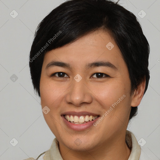 Joyful asian young-adult female with short  brown hair and brown eyes