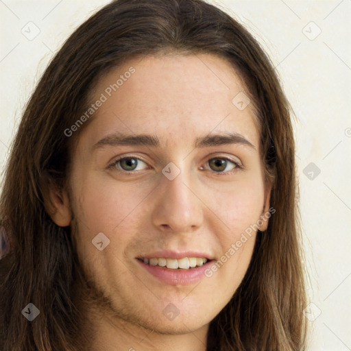 Joyful white young-adult female with long  brown hair and green eyes