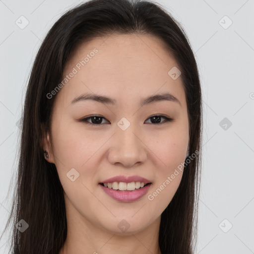 Joyful asian young-adult female with long  brown hair and brown eyes