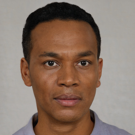 Neutral black young-adult male with short  black hair and brown eyes