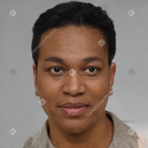 Joyful black young-adult female with short  black hair and brown eyes