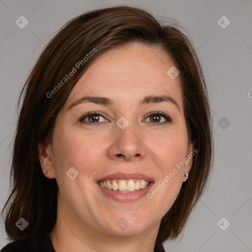 Joyful white young-adult female with medium  brown hair and blue eyes