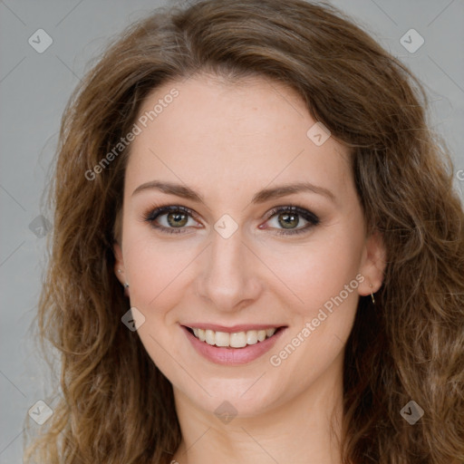 Joyful white young-adult female with long  brown hair and green eyes