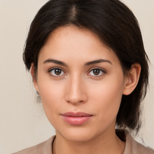 Neutral white young-adult female with medium  brown hair and brown eyes