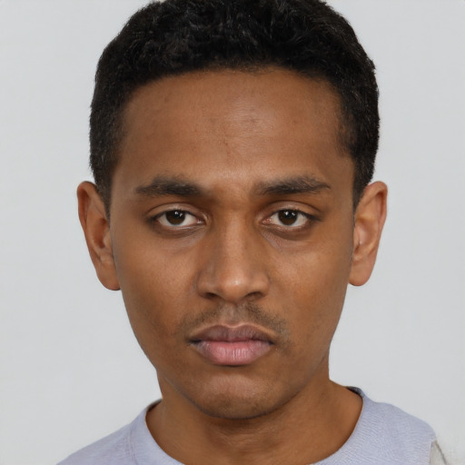 Neutral black young-adult male with short  black hair and brown eyes