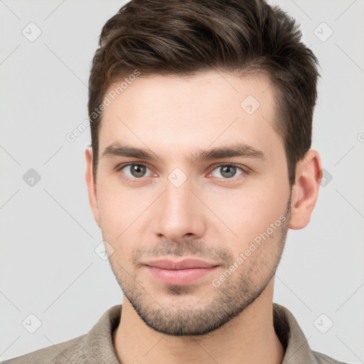 Neutral white young-adult male with short  brown hair and brown eyes