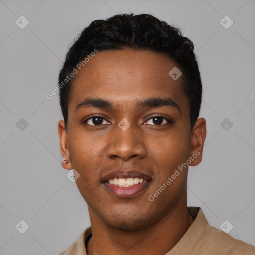 Joyful black young-adult male with short  black hair and brown eyes