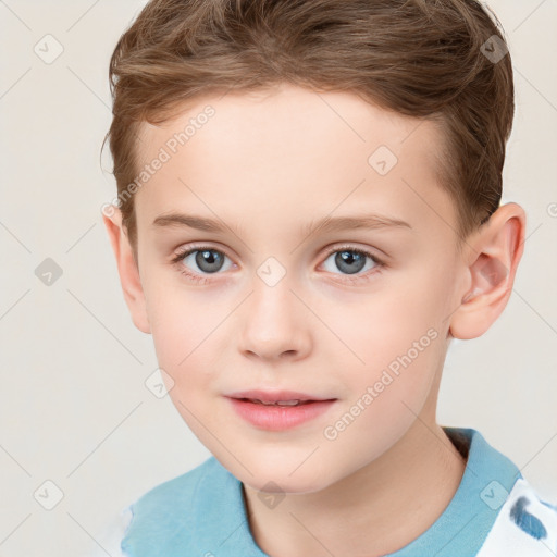 Joyful white child male with short  brown hair and grey eyes