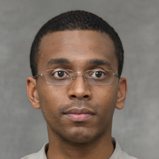 Neutral black young-adult male with short  brown hair and brown eyes