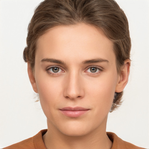 Neutral white young-adult female with medium  brown hair and brown eyes